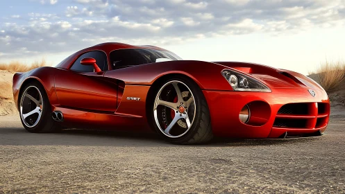 Red sports coupe parked on sandy roadside at sunset.