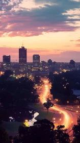 City skyline and curving arterial road at dusk