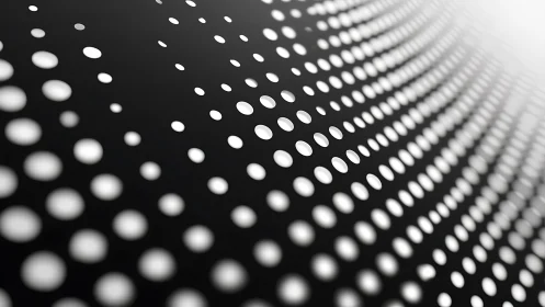 Curved black surface with receding grid of white circular dots.