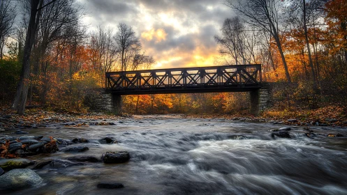 Steel truss bridge above shallow river in autumn forest.