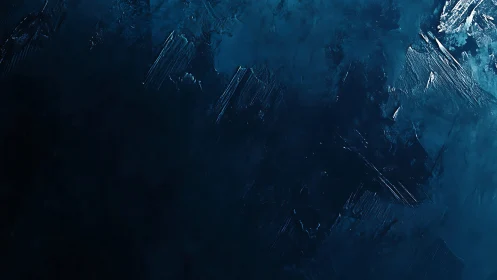 Dark blue textured abstract surface with directional strokes.