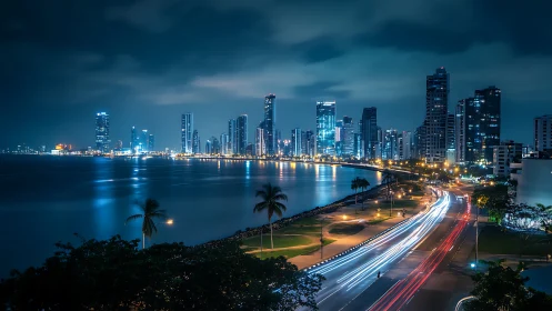Coastal city skyline glowing softly under a tranquil night.