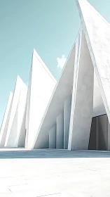 Sharp white concrete architectural facade under clear sky.