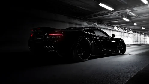 Midnight supercar gliding through a moody urban tunnel.