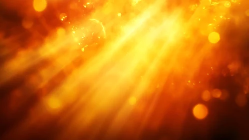 Radiant golden sunlight beams with glowing bokeh abstract background.