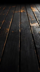 Charred wood planks glow with ember-kissed golden streaks.