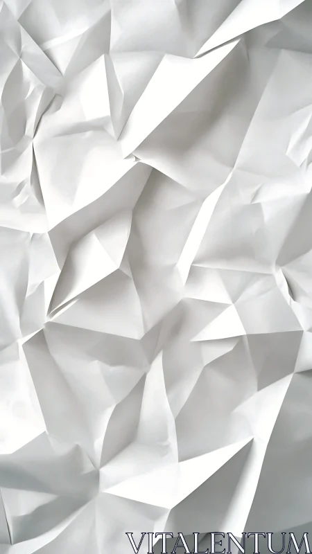Origami-inspired white paper relief with angular folds study.