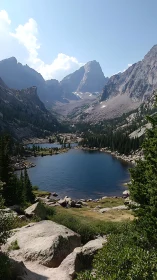 High alpine lake beneath steep rocky mountain peaks.