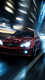 Red performance coupe travels through illuminated city street