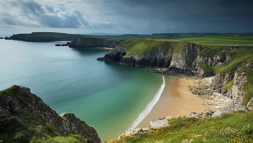 Coastal bay with cliffs, sandy beach and overcast daylight