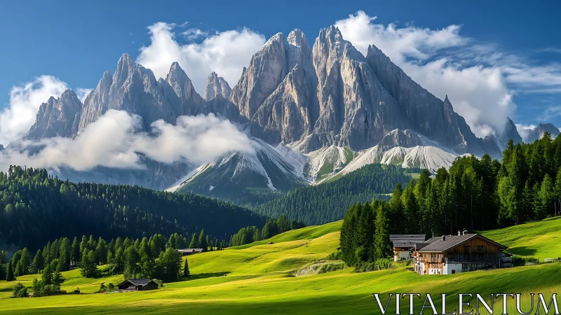 Alpine village under sharp mountain peaks and clouds.