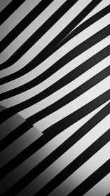 Monochrome diagonal stripes forming flowing wave pattern.