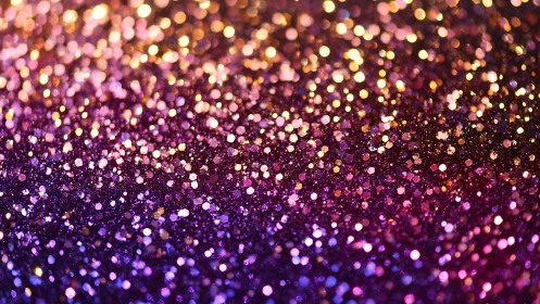Iridescent glitter bokeh gradient in magenta and gold hues.