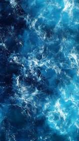 Vertical view shows turbulent blue water with surface foam