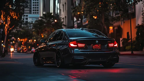 Midnight city street with glossy black sports sedan parked.