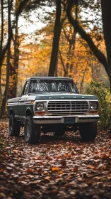 Classic forest truck paused on a golden autumn trail.