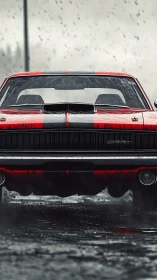 Red muscle car front view in rainy urban street scene.