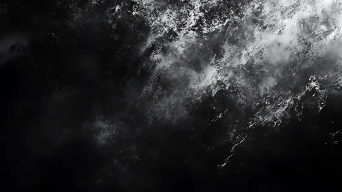 Stormlit mountain skin breathes through veils of crawling mist