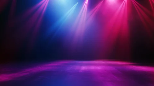 Empty stage waits while neon spotlights rehearse applause