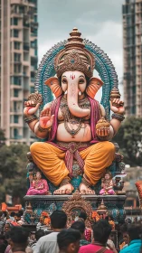 Urban processional Ganesh idol with ornate sculptural detailing.
