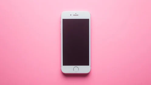 White smartphone device displayed center-frame on vibrant pink background.