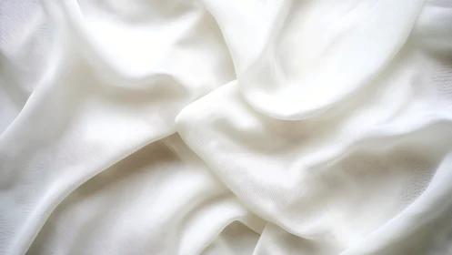 Soft white fabric folds inviting quiet moments of calm.