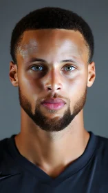 Intense male athlete portrait under studio lighting.