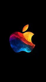 Prismatic apple emblem glows like a nebula on black night.