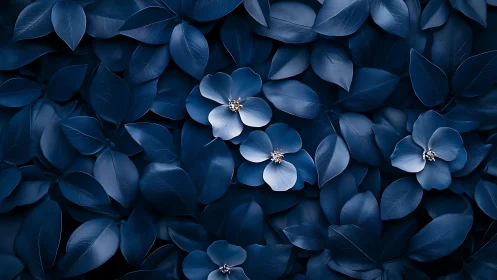 Monochrome blue floral surface with high-contrast petal specularity