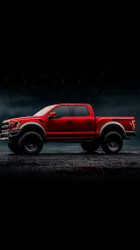 Bold red off road truck stands strong on a rainy night