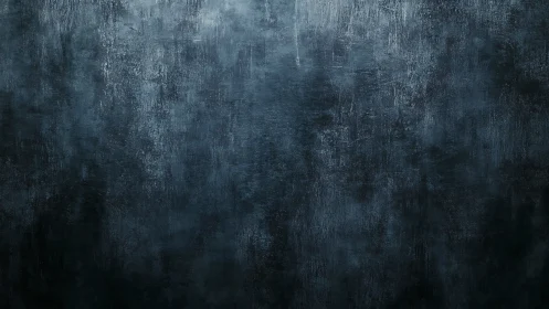 Quiet charcoal wall invites calm with softly weathered texture