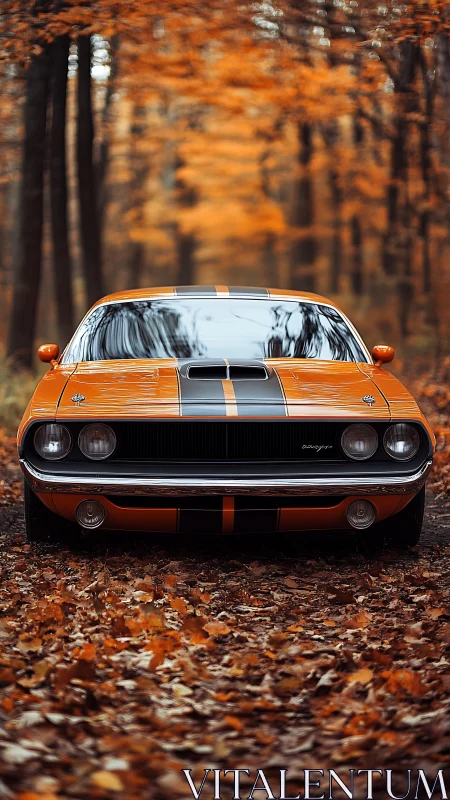 Orange classic muscle car on forest path in autumn foliage.