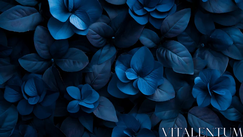 Monochrome blue floral foliage pattern in close-up view.