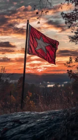 Red star flag ripples over autumn lake at fiery sunset.