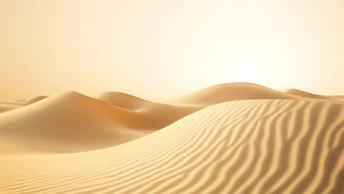 Sunlit sand dunes form smooth ridges under soft haze