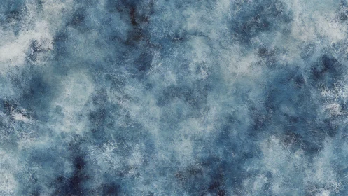 Storm-brushed ice clouds drift across a frosted blue field