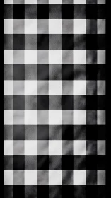 Monochrome checkered grid explores tonal variance in pattern