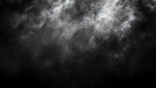 Dark vapor cloud drifts through moody monochrome space.