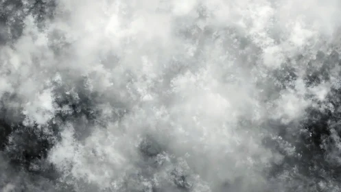 Gentle storm clouds drift together in a soft gray sky