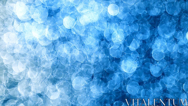 Blue bokeh light abstraction with layered circular glow.