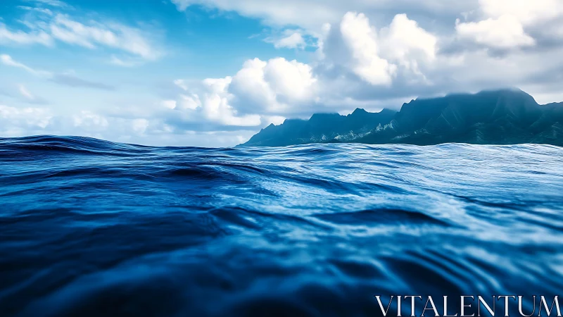 Gentle ocean swells welcoming distant misty island peaks.