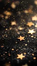 Golden star confetti scattered on black glitter surface.