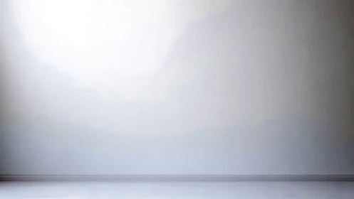 Minimalist empty white wall interior with soft light glow.