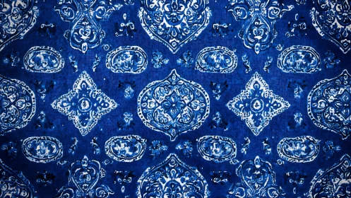 Rich blue ornamental textile pattern evokes vintage elegance