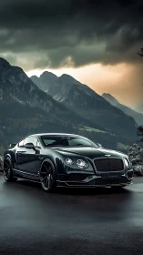 Luxury black grand tourer waits under brooding alpine skies