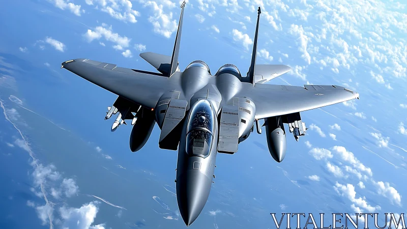 Stealth fighter jet slices through bright blue open sky