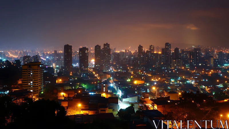 Glowing high-rise skyline over dense city blocks at night.