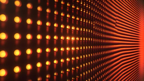 Close-up of glowing orange LED matrix in abstract digital style.