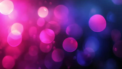 Defocused magenta and blue circular light bokeh fills frame