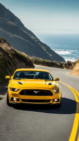 Yellow sports coupe travels coastal mountain highway bend